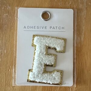 Epsilon—White and Gold Adhesive Patch